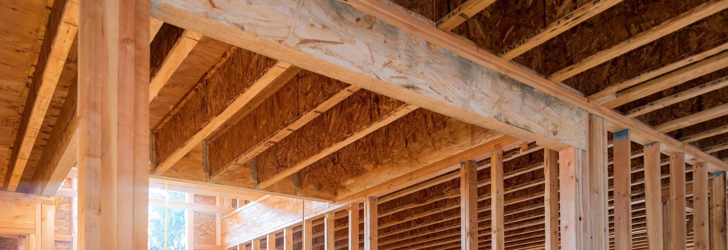 Framing beam of new house under construction home framing
